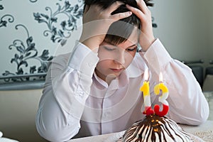 Upset teenager alone marks a thirtieth birthday