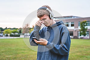 Upset teenager listening to music.