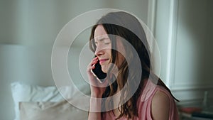 Upset woman answering mobile phone at night closeup. Unhappy sad girl crying