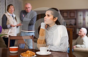 Upset woman after quarrel with husband and parents