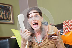 Upset Woman Yelling Into Phone