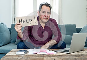 Upset young man asking for help in paying bills Mortgage home or business finance problems