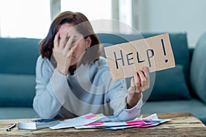 Upset young woman asking for help in paying bills Mortgage home or business finance problems