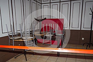 upside down chairs. visitor restriction. cafe closed