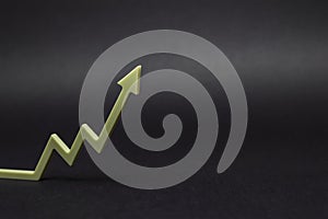 An uptrend, increased sales, or increased value. graphic arrows pointing upwards on black background for banner, design or text
