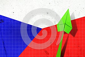 Upward arrow on the background of the flag of Czech Republic. Paper plane. Economic recovery. Copy space. Business