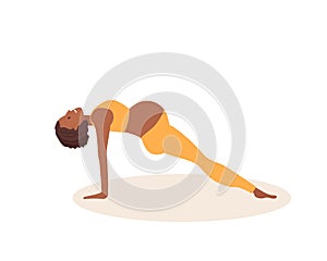 Upward plank pose. Pregnant African American woman doing yoga. Woman in sportswear doing floor exercises on mat. Active