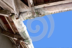 Upward View Of Mouldy Neglected Asbestos Guttering