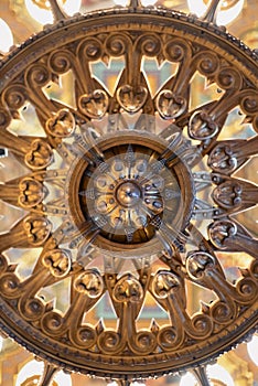 Upward view of ornately designed chandelier