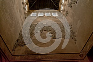 Upward view to the inside walls of a tower of, of Nasrid Palace , Alhambra, Spain