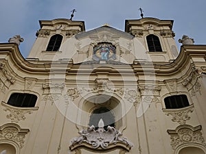 Upward view on two towers of baroque church of saint Peter and Paul in benedictine monastery of Rajhrad, Czech Republic
