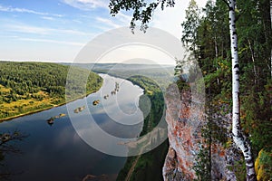 Ural mountains in the northern ridge. Rocks and rocky rifts on a mountain river in autumn