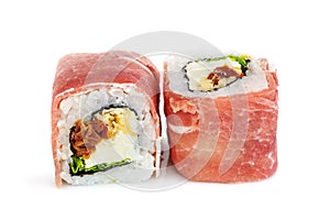 Uramaki maki sushi with procsiutto, two rolls isolated on white photo