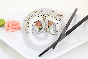 Uramaki with salmon.  Traditional japanese sushi rolls