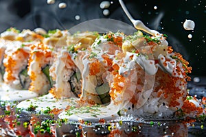 Uramaki sushi rolls with cream cheese, snow crab, cucumber, flying fish caviar, mayonnaise, lemonillustration photo