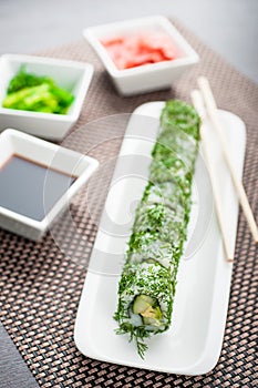 Uramaki sushi vegi green maki on a dish