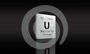 Uranium element on a metal periodic table on dark background. 3D rendered icon and illustration