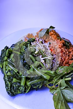 Delicious traditional mix vegetables with coconut from java called urap urab or kluban