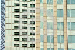 Urban abstract background, detail of modern glass facade, office business building.