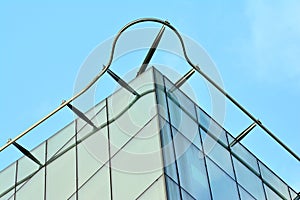 Urban abstract background, detail of modern glass facade, office business building.