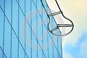 Urban abstract background, detail of modern glass facade, office business building.