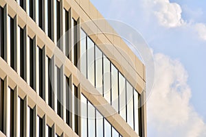 Urban abstract background, detail of modern glass facade, office business building.