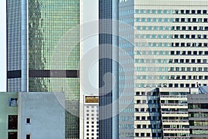 Urban abstract background, detail of modern glass facade, office business building.