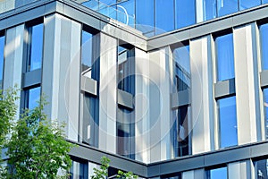 Urban abstract background, detail of modern glass facade, office business building.