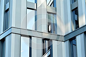 Urban abstract background, detail of modern glass facade, office business building.