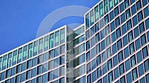 Urban abstract - windowed wall of office building.