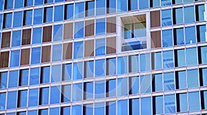 Urban abstract - windowed wall of office building.