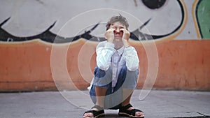 Urban Adventure: Energetic Boy Battling Sleepiness on the Street