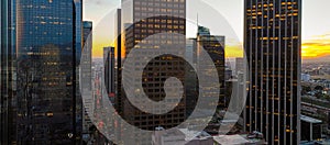 Urban aerial view of downtown Los Angeles. Panoramic city skyscrapers, downtown skyline at sunset.