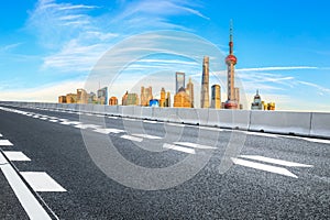 Urban architectural landscape skyline and asphalt road in Shanghai