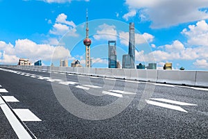 Urban architectural landscape skyline and asphalt road in Shanghai
