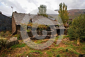 Urban autumn landscape in one of black cities of Spain Majaelra photo