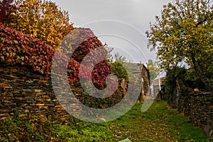 Urban autumn landscape in one of black cities of Spain Majaelra photo