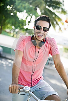 Urban biker with headphones