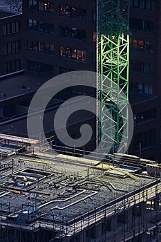 Urban Building Construction crane in dark