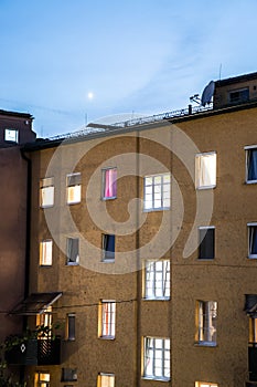 Urban city life: Flats and apartments at dusk. Real estate and property