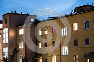 Urban city life: Flats and apartments at dusk. Real estate and property