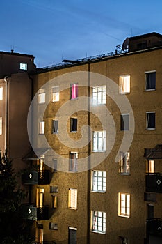 Urban city life: Flats and apartments at dusk. Real estate and property