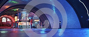 Urban city retro futuristic back drop tunnel background with neon accents.