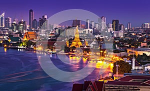 Chao Phraya River with Wat Arun, Bangkok,Thailand photo