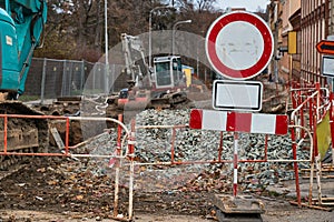 Urban construction site with warning signs