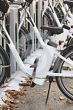 Urban electric bikes charging batteries in the city. Transport