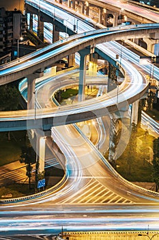 Urban elevated road junction and interchange overpass at night