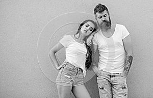 Urban fashion. Fashion trend comfortable simple clothing for man and woman. Couple grey background. Urban lifestyle