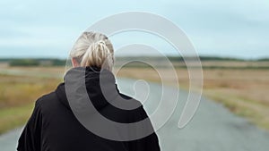 Urban female in black anorak