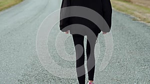 Urban female in black anorak